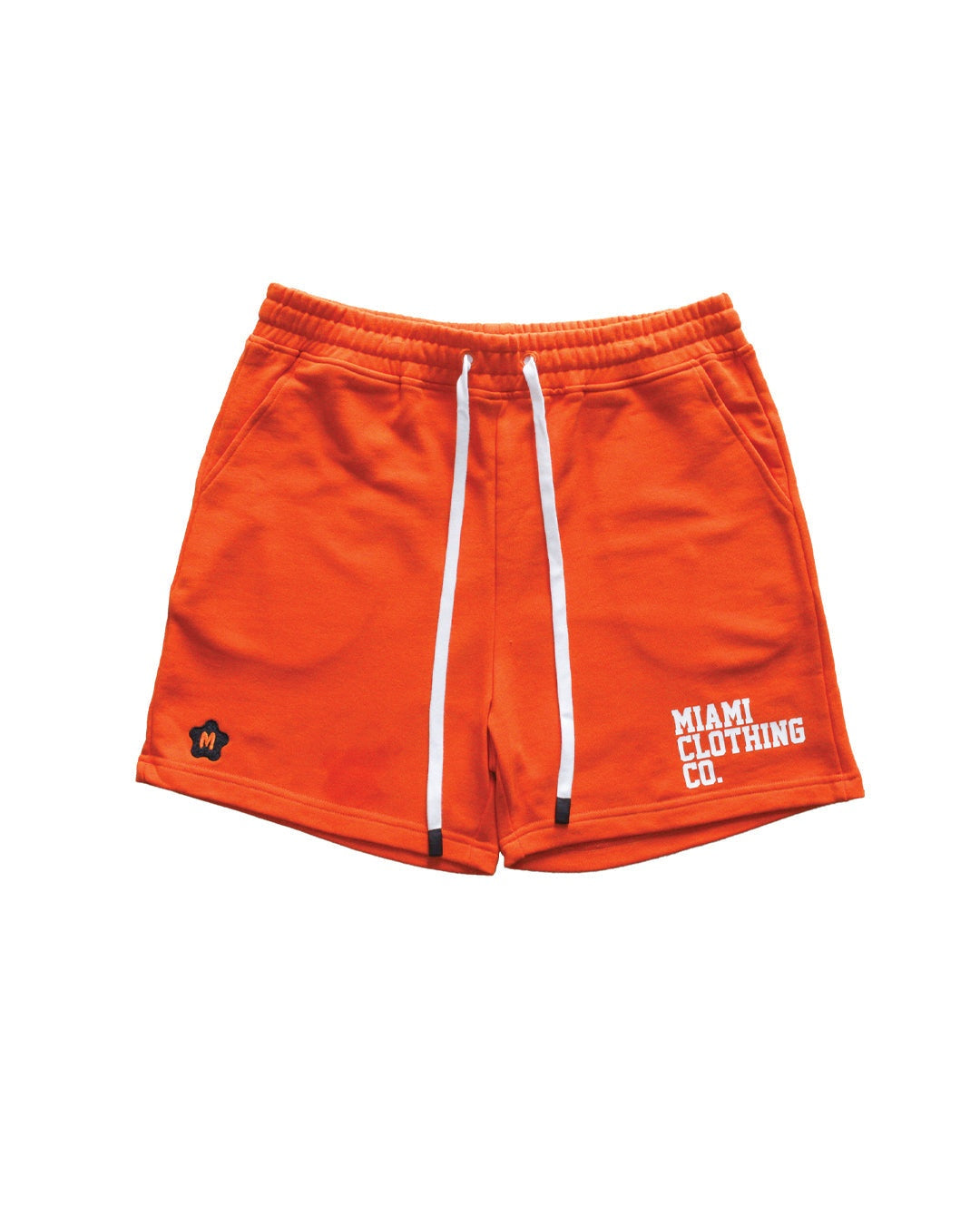 Orange french terry material shorts by Miami Clothing Co. with logo and drawstrings.