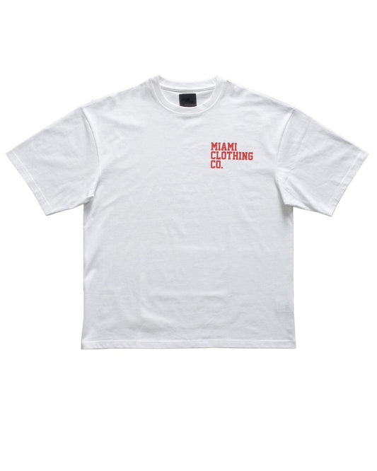 Oversized white cotton t-shirt with "Miami Clothing CO." graphic on left chest.